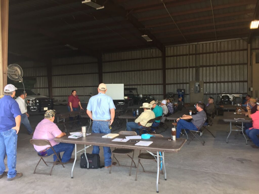 Israel Salazar, a soil and water conservation district board member and a Willacy county producer, speakes during a Forage Field Day in 2018. a SWCD board member and a Willacy county producer.